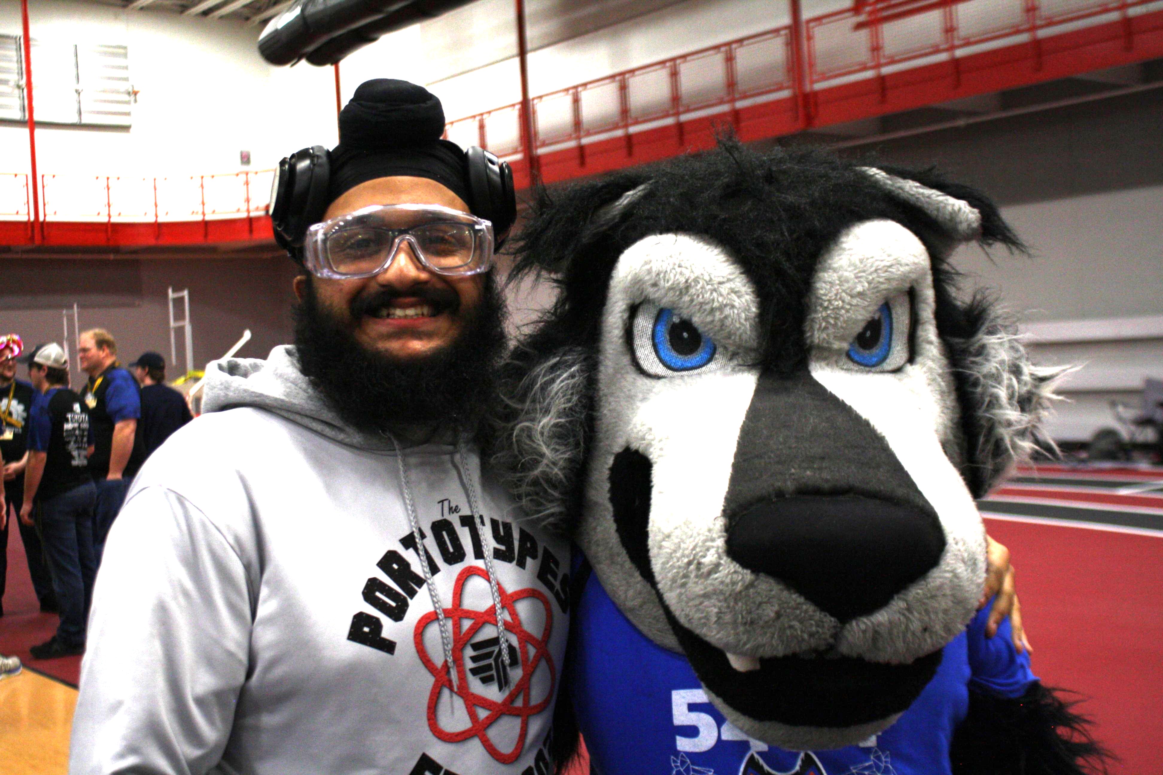 Posing with other team mascot